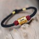 The red string provides good luck and protection against negative energy The red string provides good luck and protection against negative energy