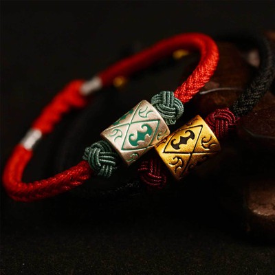 The red string provides good luck and protection against negative energy
