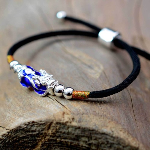 Pixiu brings wealth and protection, while silver enhances clarity and focus Pixiu brings wealth and protection, while silver enhances clarity and focus