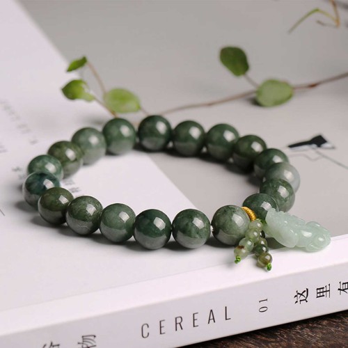 Emerald attracts abundance, while Pixiu protects and brings good fortune Emerald attracts abundance, while Pixiu protects and brings good fortune
