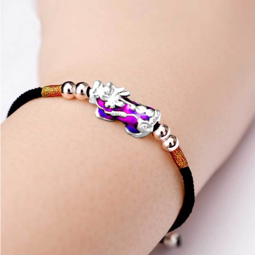 Pixiu brings wealth and protection, while silver enhances clarity and focus Pixiu brings wealth and protection, while silver enhances clarity and focus