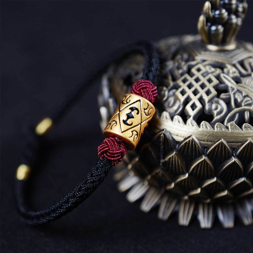 The red string provides good luck and protection against negative energy The red string provides good luck and protection against negative energy