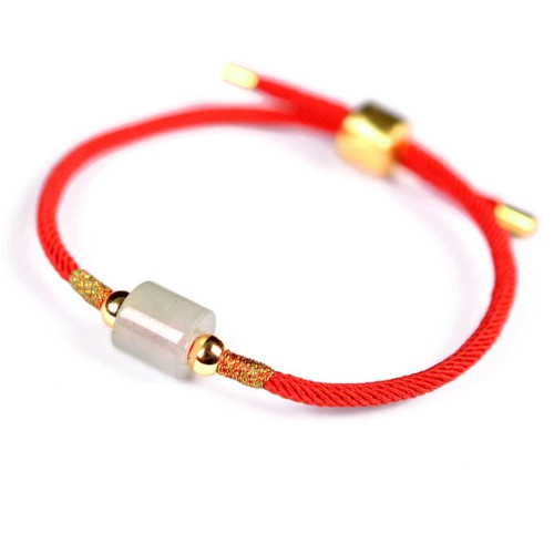 Aventurine attracts prosperity and the red string enhances confidence and positive energy