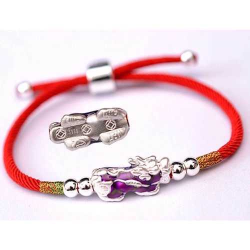 Pixiu brings wealth and protection, while silver enhances clarity and focus Pixiu brings wealth and protection, while silver enhances clarity and focus