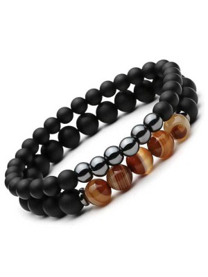 Agate and Hematite provide balancing and protective qualities, fostering stability