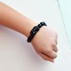 Black Obsidian shields against negativity, while Pixiu attracts wealth and success Black Obsidian shields against negativity, while Pixiu attracts wealth and success