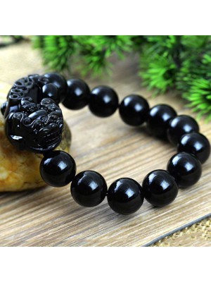 Black Obsidian shields against negativity, while Pixiu attracts wealth and success