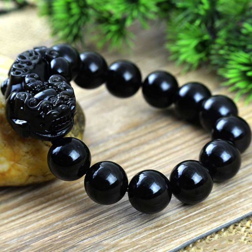 Black Obsidian shields against negativity, while Pixiu attracts wealth and success Black Obsidian shields against negativity, while Pixiu attracts wealth and success