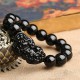 Black Obsidian shields against negativity, while Pixiu attracts wealth and success Black Obsidian shields against negativity, while Pixiu attracts wealth and success