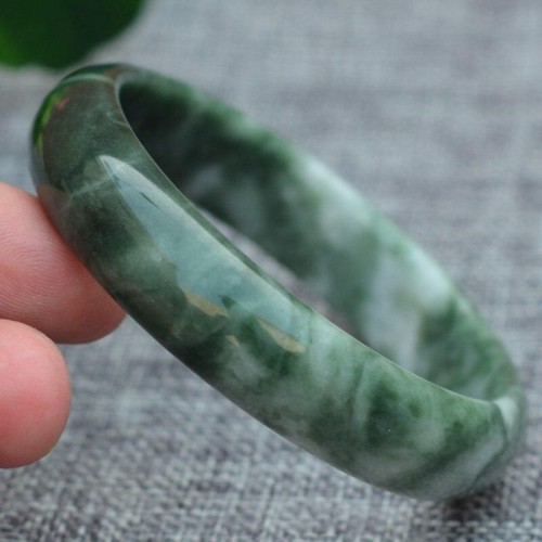 Jade symbolizes prosperity, protection, and emotional balance