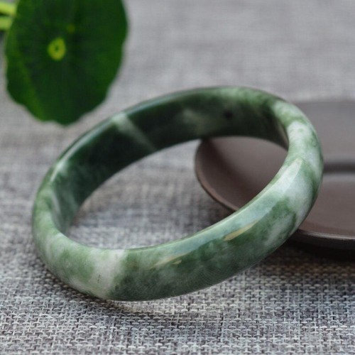Jade symbolizes prosperity, protection, and emotional balance