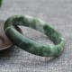 Jade symbolizes prosperity, protection, and emotional balance