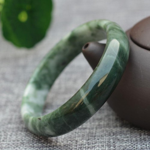 Jade symbolizes prosperity, protection, and emotional balance