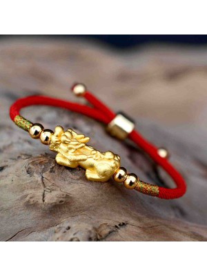 The red string and Pixiu attract wealth, good fortune, and financial prosperity