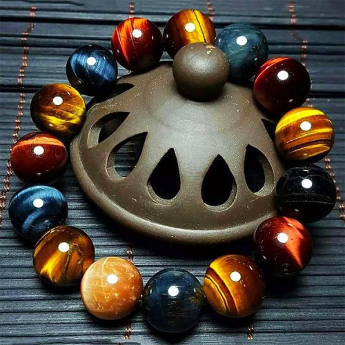 Tiger's Eye attracts wealth, boosts personal power, and the Feng Shui element provides overall protection Tiger's Eye attracts wealth, boosts personal power, and the Feng Shui element provides overall protection